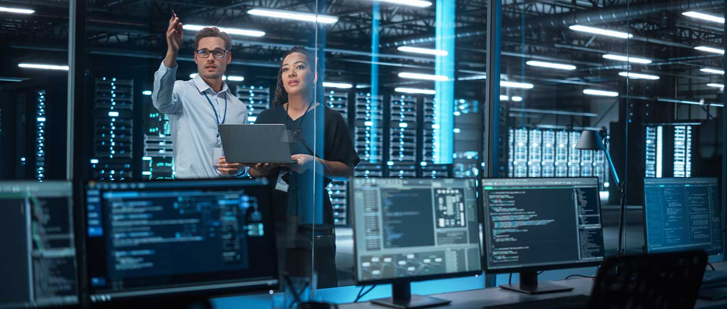 data center and engineers talking with each other