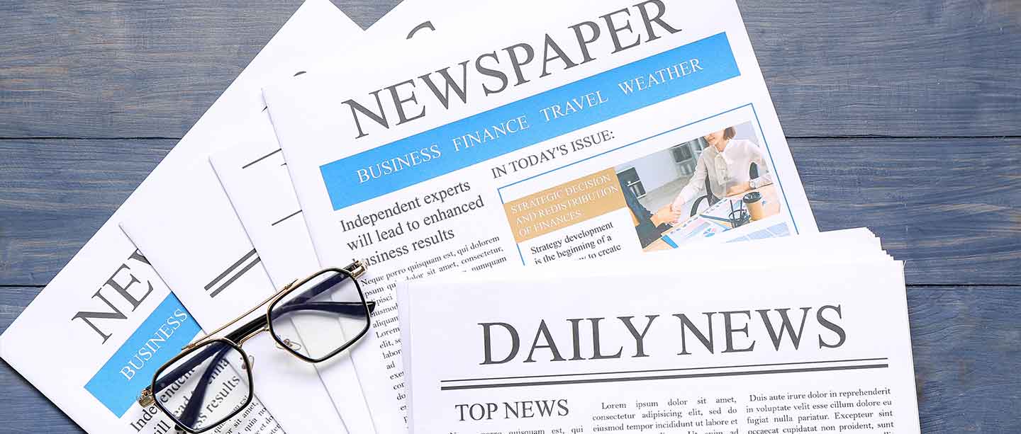 newspapers and glasses